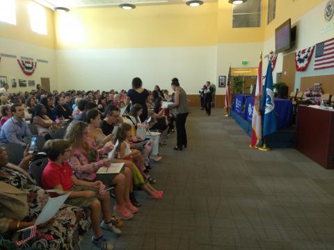 Federal Representatives Passing Out Citizenship Certificates 8-11-2017