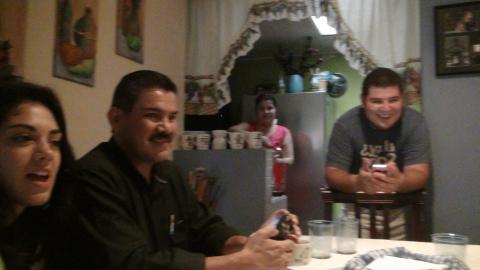 Ali Sanchez's Sister, Freddy Garcia Sr. and Ali Sanchez at the Table