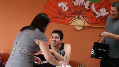 Why Is Freddy Garcia Jr. So Happy, From the Present or the Cake He is about to receive?