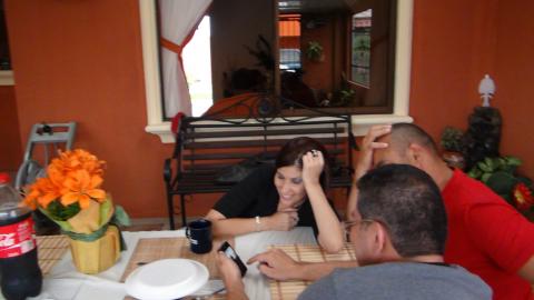 Vanessa Rodriguez, Steven Strasburger and Freddy Garcia Sr. Checkinf Out Fackbook