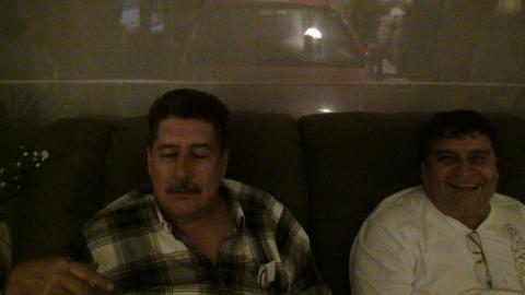 Mauuel Alfaro and a Party Guest