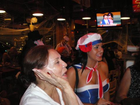 Myriam Norman and a Hooter's Waitress
