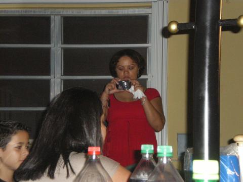JoAnna Taking Pictures of the New Year Eve BBQ