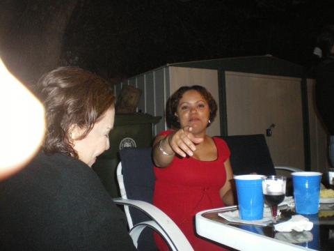 JoAnna Campos trying to Get Myriam Norman to Look at the Camera