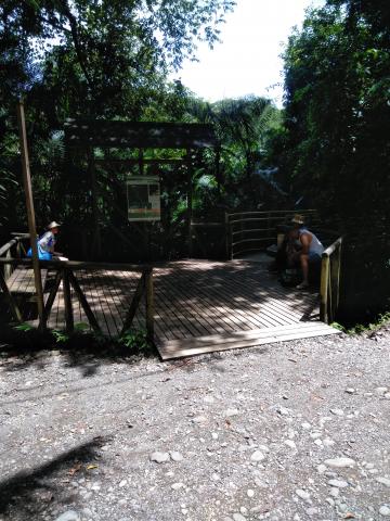 Steven Strasburger, Myriam Norman and Marjorie Soto In the Rest Area on the Pathway through the Jungle at Parque Nacional Manuel Antonio Park Costa Rica